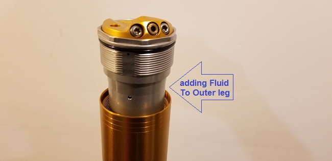 How to service Ohlins 48RXF Fork and add Oil for bottoming control